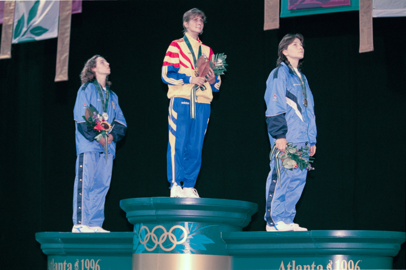 Valentina Vezzali of Italy, Laura Badea of Romania, and Giovanna Trillini of Italy. Photo via Getty Images.